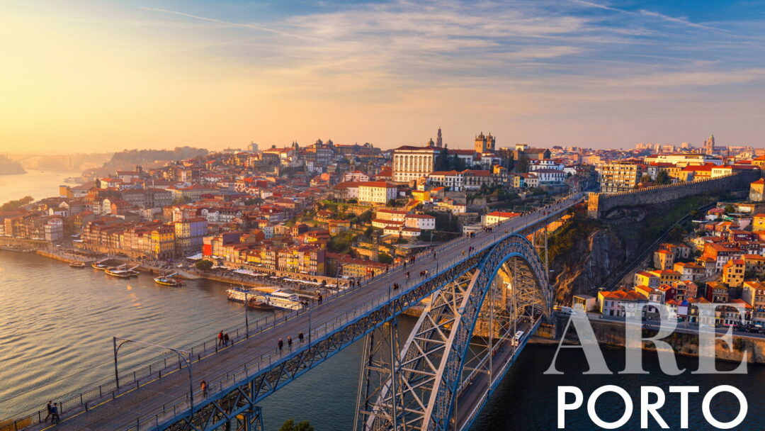 Porto city views, with Luís I Bridge, Douro river and sunset