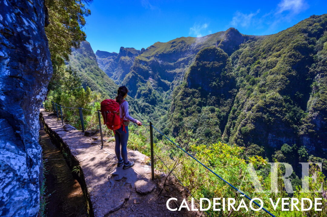 <strong>Levada do Caldeirão Verde</strong> is a popular hiking trail in Madeira. It starts at Casa de Abrigo das Queimadas, a traditional thatched house in Queimadas Forest Park. The trail offers stunning views of the island's interior, lush forests, and dramatic landscapes. It goes through the Laurissilva forest, a UNESCO World Heritage site rich in unique plants and animals. The path <strong>follows an 18th-century irrigation channel and passes through four rock-carved tunnels, ending at the beautiful Caldeirão Verde lake with a <strong>waterfall cascading from 100 meters above.