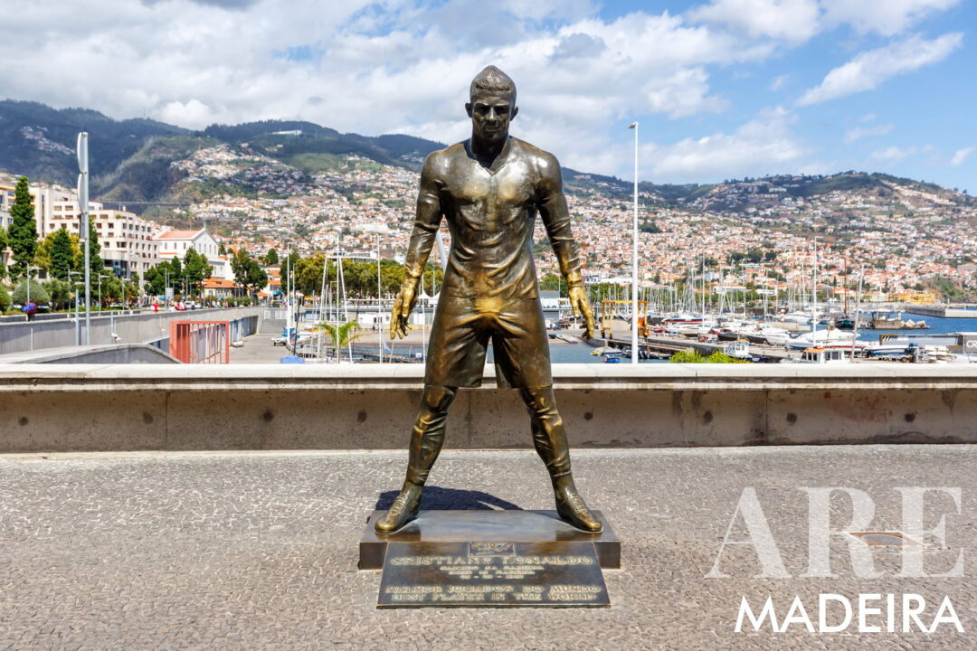 In the Funchal center area, you can visit the <strong>Cristiano Ronaldo Statue</strong> and the <strong>CR7 Museum</strong>, dedicated to the famous footballer—a must-visit if you're a sports enthusiast. Pass through the <strong>Cruise Terminal Funchal</strong> to see impressive cruise ships docking and enjoy the bustling maritime activity. Walk along the <strong>Marina do Funchal</strong> to see various boats and yachts, and perhaps take a boat tour to explore the coastline. Continue to <strong>Praça do Povo</strong>, a popular square hosting various events and offering a vibrant atmosphere. Finally, explore the <strong>Museu de Electricidade Casa da Luz</strong>, showcasing the history of electricity in Madeira, and end your path at <strong>Forte São Tiago</strong>.