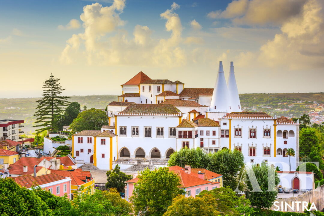 The Palácio Nacional de Sintra, marked by its iconic twin conical chimneys, stands as a historic royal residence in the heart of Sintra.