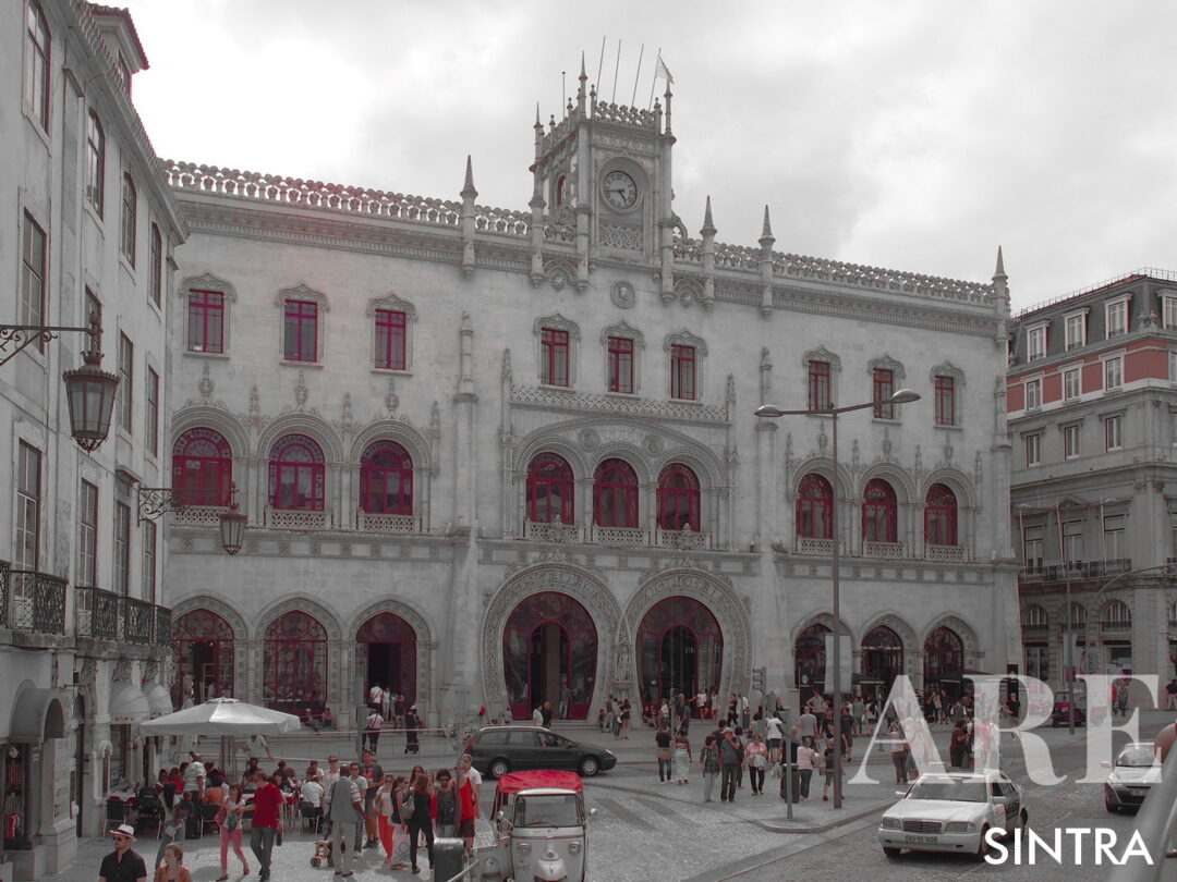 Estação do Rossio in Downtown Lisbon features a distinct entrance facade and is the departure point for trains to Sintra.